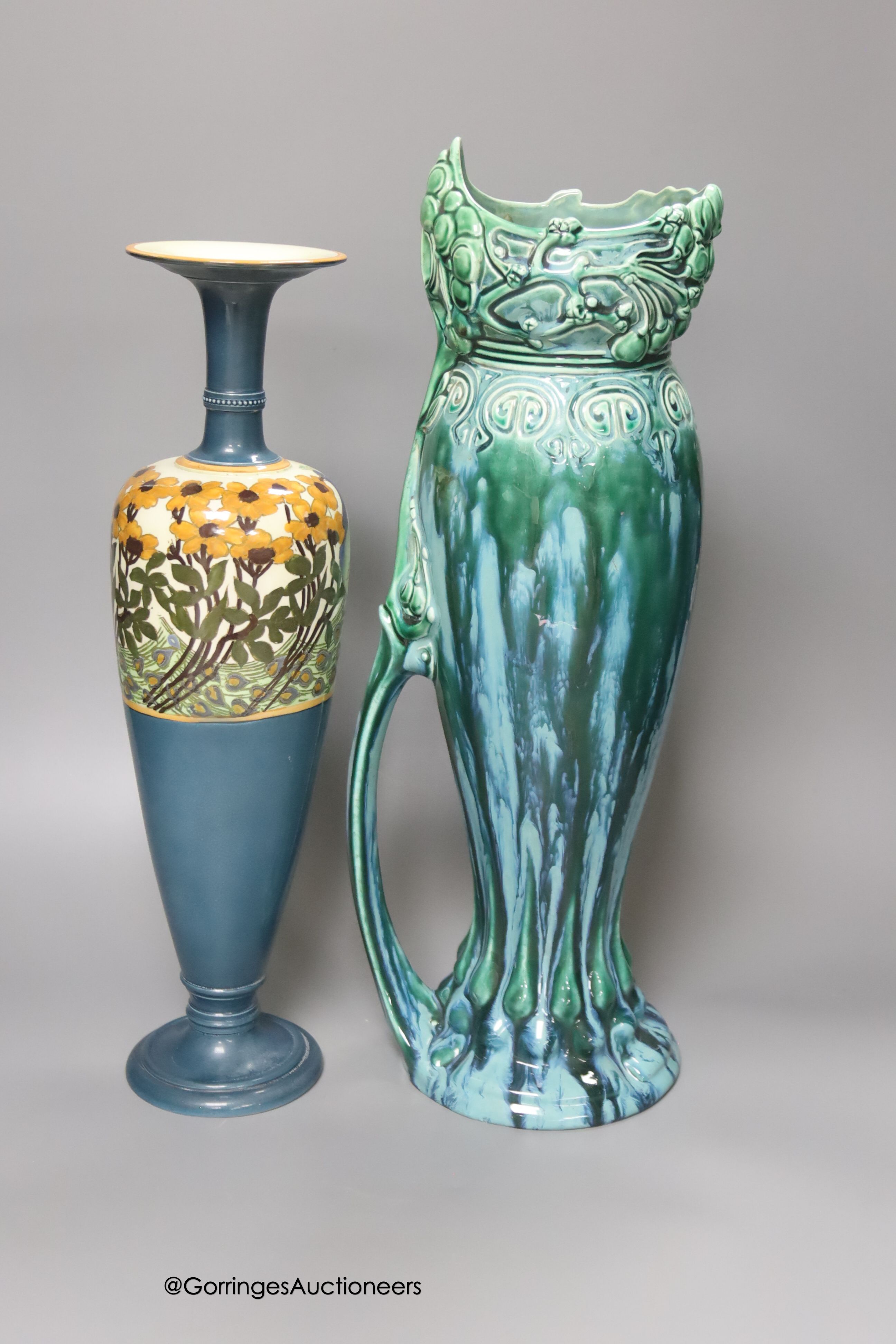 A Royal Staffordshire pottery peacock vase, height 38cm and an Austrian Julius Dressler earthenware ewer with green glaze effects